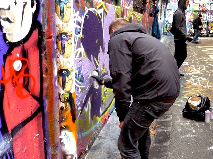 Sprayer in der Hosier Lane in Melbourne