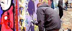 A street artist in Melbourne's famous Hosier Lane 