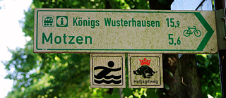 German Town Signboard - Motzen © © Detail © Dirk Ingo Franke, Public domain, via Wikimedia Commons German Town Signboard - Motzen
