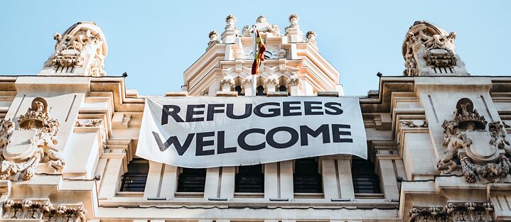 Banner on the façade of Madrid City Hall with the inscription "Refugees Welcome".