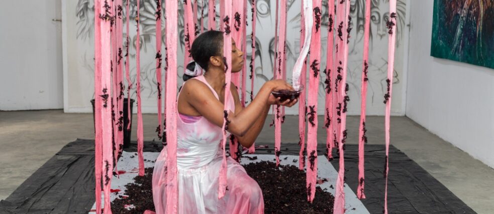 Bolatito Aderemi-Ibitola stands among pink ribbons