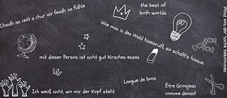 short multilingual texts written on blackboards with white chalk
