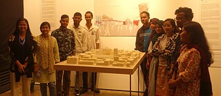 Korail youth with the final design model at the Korail play exhibition at Drikpath. 