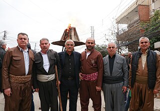Syrian Kurdish men in traditional outfits during Newroz festivities, Qamishli, Syria. 