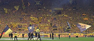 The “yellow wall” – terraces packed with 25,000 Dortmund fans.