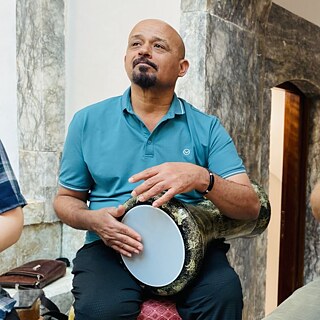 Abbas Henesh Playing the percussion 