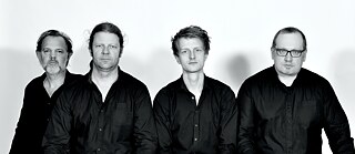 Quartett Zoom - Stephan Mattner (Tenorsaxophon), Philipp van Endert (Gitarre), Sebastian Räther (Bass), Jo Beyer (Schlagzeug)