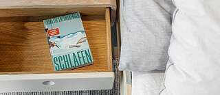 Bedside drawer with book (Enzensberger: Schlafen)