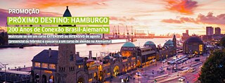 Imagem mostra porto da cidade de Hamburgo ao anoitecer © Canva Promoção próximo destino Hamburgo