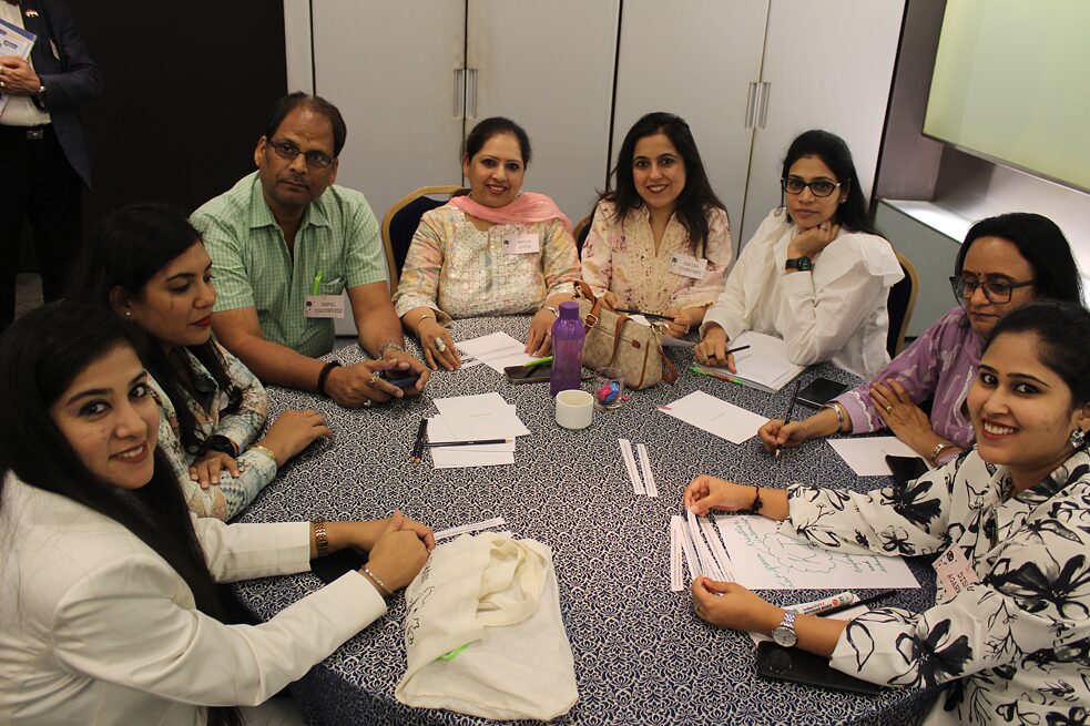 Group of teachers at round table