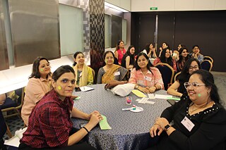 Teachers in workshop at round table