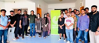 A group of people who attended this event pose for a photo