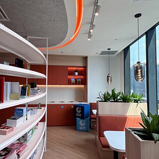 Library shelves by a sunlit window