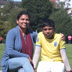 Biji and her son Gautam witnessing Norway vs. Germany in Krefeld, Germany.