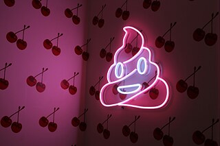 poop emoji neon sign