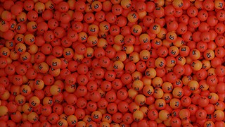 Pile of orange balls with angry and swearing emoji icons