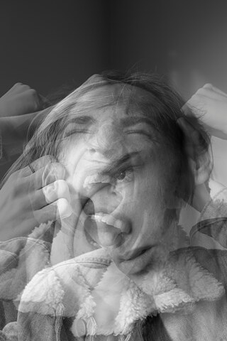 grayscale photo of a person multiple exposure