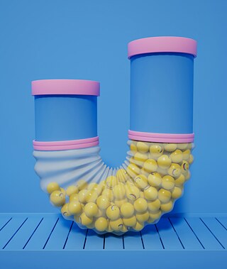 a blue and pink plastic tub with yellow balls in it