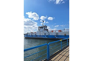 Gateway to a ferry at the shore. 