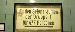 A sign at the U-Bahn station Hermannstrasse is a reminder of very dark days: air-raid shelters were built into the shafts of the U8 during the Second World War.