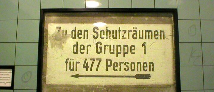 A sign at the U-Bahn station Hermannstrasse is a reminder of very dark days: air-raid shelters were built into the shafts of the U8 during the Second World War.