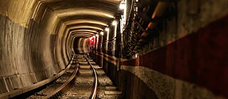 In 1980, a railway signalman and his family escaped from the GDR to West Berlin via the service tunnel that links up with the U8 tunnel. A U8 train driver picked up the refugees and smuggled them past the border guards in his cab, all the way to West Berlin.