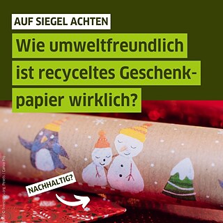 Text auf Bild: "Auf Siegel achten. Wie umweltfreundlich ist recyceltes Geschenkpapier wirklich?", Bild: Geschenkpapier Rolle mit Schneemenschen, Pinguin, Tannenbaum