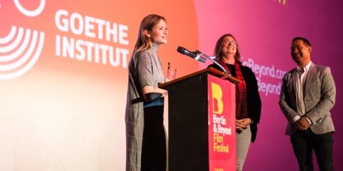 Sigrid Savelsberg, director of the Goethe-Institut in San Francisco, and festival director Sophoan Sorn with Julia Jentsch at the award ceremony at the Castro Theater.