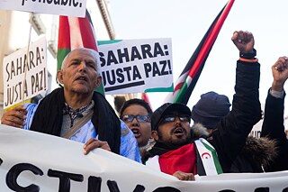 Latitude – November 16, 2019, Madrid, Spain: Saharawis shouting slogans during the demonstration..Thousands of Saharawis arrive from all over Spain to demand the end of Morocco's occupation in Western Sahara, the freedom of political prisoners, in support of the Polisario Front and to demand solutions from the Spanish government..Western Sahara was a Spanish colony until 1976 where Spain left the territory. Later Morocco occupied part of Western Sahara and still part of the Saharawi population lives in refugee camps in the desert in Algeria and in Spain.