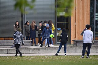 Racism - Munich: Primary school children with migration background in the schoolyard of a primary school.