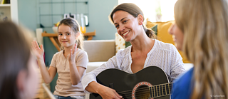 Woman playing the guitar