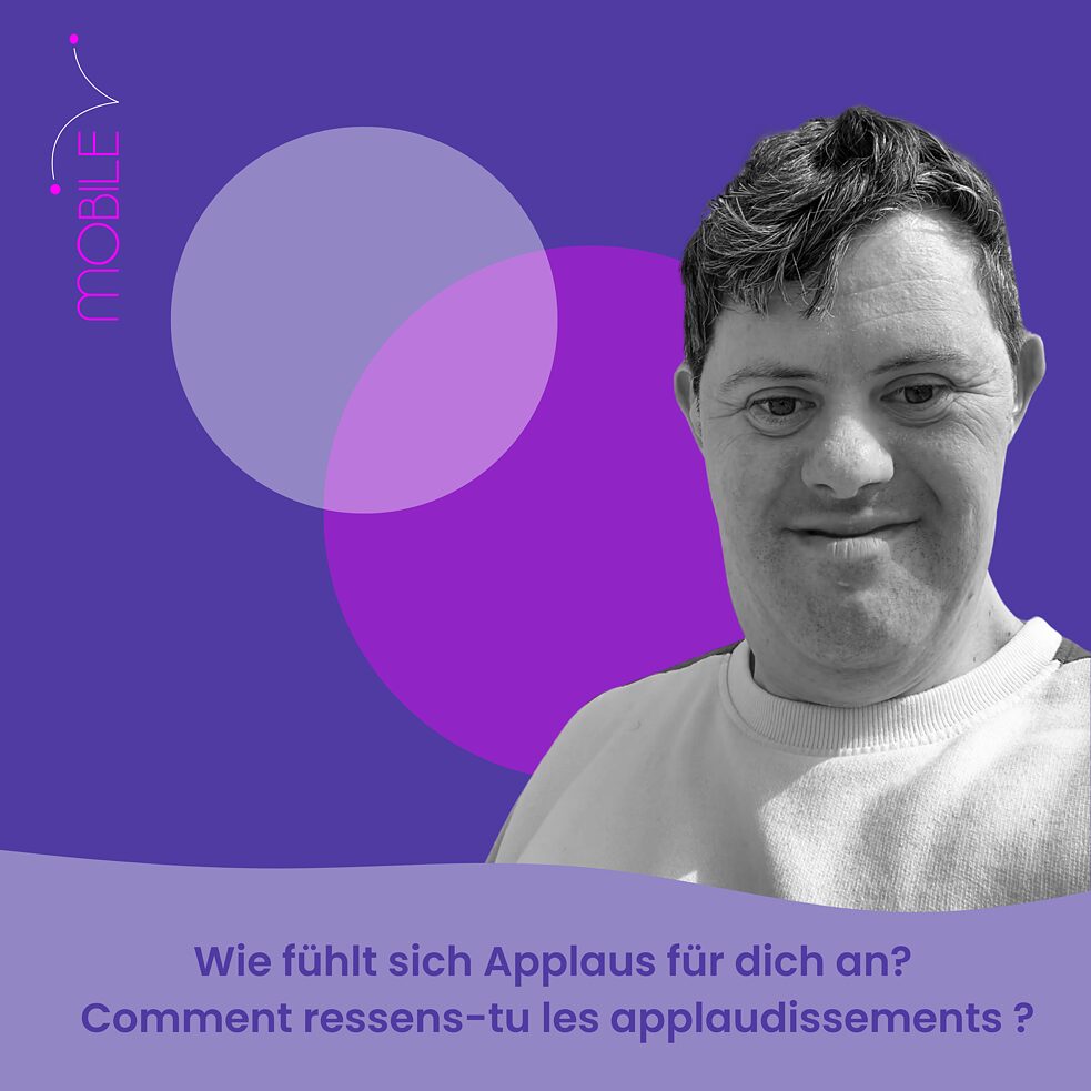 Wie fühlt sich Applaus für dich an ? Lukasz Loska lächelt in die Kamera.