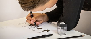 A child drawing icons