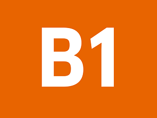 B1 in weiß auf orangefarbenem Hintergrund