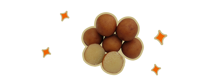 Seven round balls made from marzipan